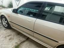 A picture of Mazda 323 neatly