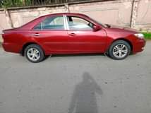 A picture of Toyota camry 2 4 in perfect working condition Location Aba
