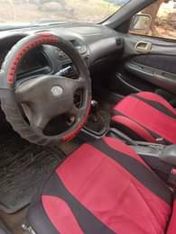 A picture of Well used clean Toyota Corolla with manual gear engine and