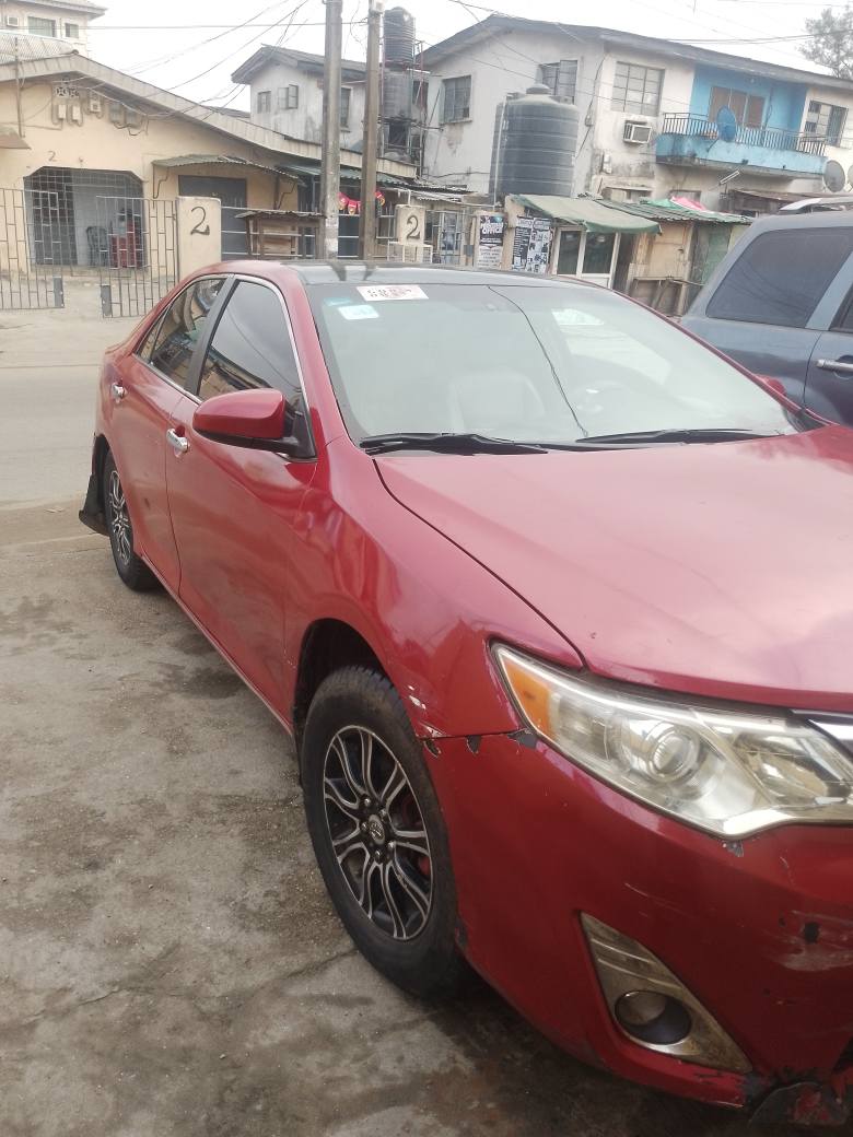 A picture of Destress Toyota Camry 2013 engine gear and a c perfect