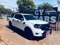 Cy C.