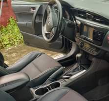 A picture of Good price Foreign Used 2014 black Toyota Corolla Sport Thumbstart