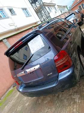 A picture of CLEANINESS PLUS GODLINESS IN A VEHICLE 3ROWS super clean and