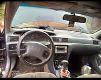 A picture of Toyota Camry tiny light Bake once Clean as seen ac