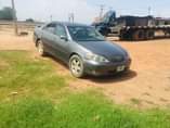 A picture of 04 Toyota Camry big daddy Ibadan painted Engine gear and
