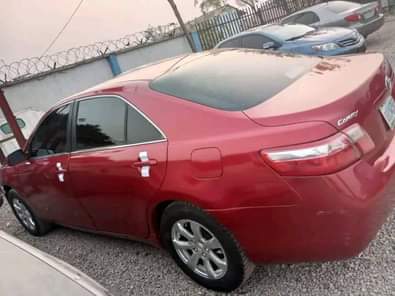 A picture of RED Neatly used ND registered Toyota Camry LE 2008 model