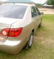 A picture of Toks standard Corolla 2004 Engine and gear AC chill like