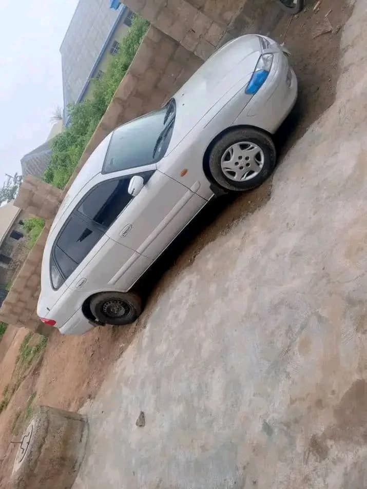 A picture of Fast fingers money needed asap Mazda 626 lift back tokunbo