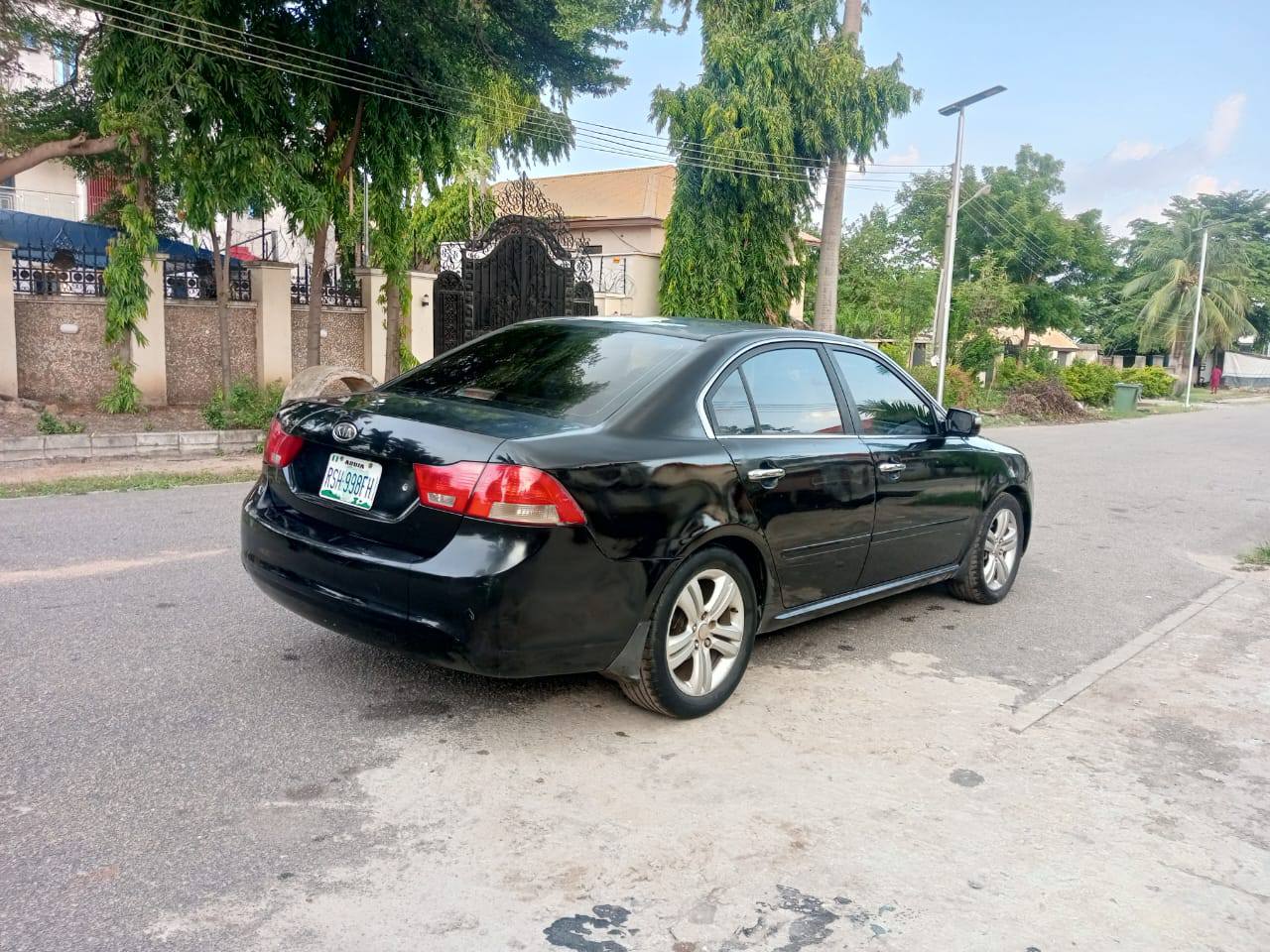A picture of  Super distress 2010 Kia optima with sound engine automatic