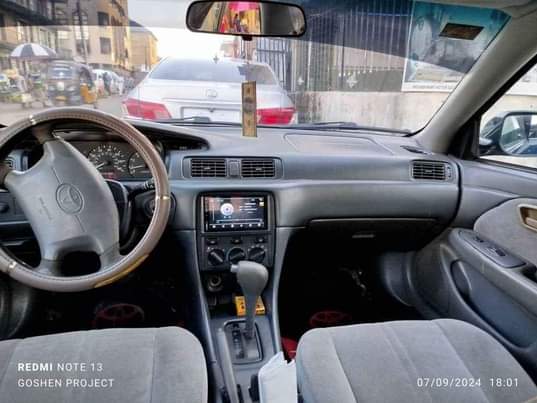 A picture of Super clean Toyota Camry Tiny big