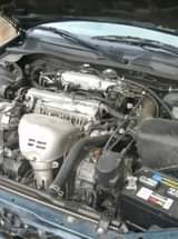 A picture of Toks green toyota camry tiny light extremly clean lagos cleared