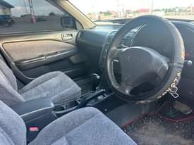 A picture of TOYOTA CARINA TI 1490 CC BEI 5 5 MIL HAINA