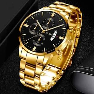 A picture of Golden watch and bracelet