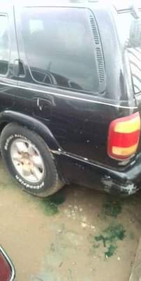 A picture of 2004 Black 2004 Pathfinder Nissan jeep B