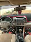 A picture of Super clean Toks standard white 2006 model with android and