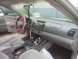A picture of Toks Standard Firstbody 2004 Toyota clean interior and exterior engine