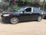 A picture of 2008 Toyota Camry sound four plugs engine Neat interior Ac