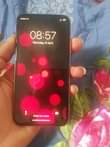 A picture of IPhone x 64GB with face id 100 battery health