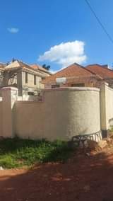 A picture of House on sale 185m located at Bwebajja on entebbe Has