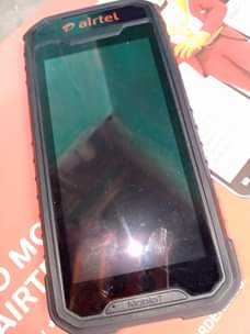 A picture of Machine and phone that registers verifies and swaps lines 0701645723
