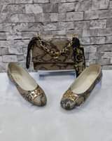 A picture of Shoes and bag
