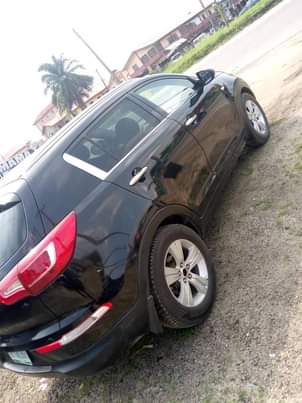 A picture of Kia Sportage 2012 Black SUV