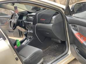 A picture of 2004 Corolla for 2 250 litt dent on the bumber
