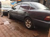 A picture of TOYOTA kikumi Corolla gray UAM Call 0703676426 buy drive