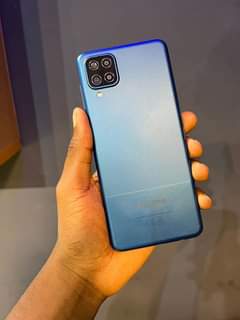 A picture of SAMSUNG A12 Storage 64GB Ram 4GB Bettry 4500mAh Price 250000