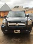 A picture of Just few months used 2008 09 Honda pilot 3 seaters
