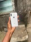 A picture of Iphone x no face id with little color line on