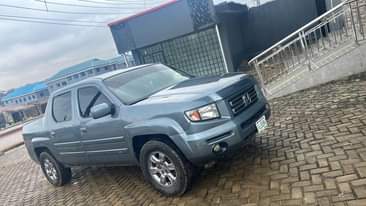 A picture of VERY CLEAN PAINTED ON FIRST BODY HONDA RIDGELINE 2008 MODEL