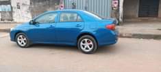 A picture of Very clean Toyota Corolla with good engine and gear chilling