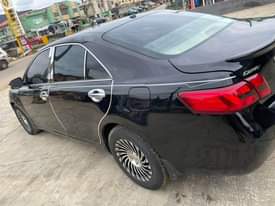 A picture of V clean toks standard 2010 Toyota Camry 4 plugs engine