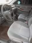 A picture of Toyota corolla 05 engine is taping but not smoking just