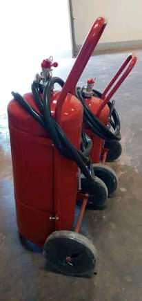 A picture of Fire extinguishers and car tracking devises in stock