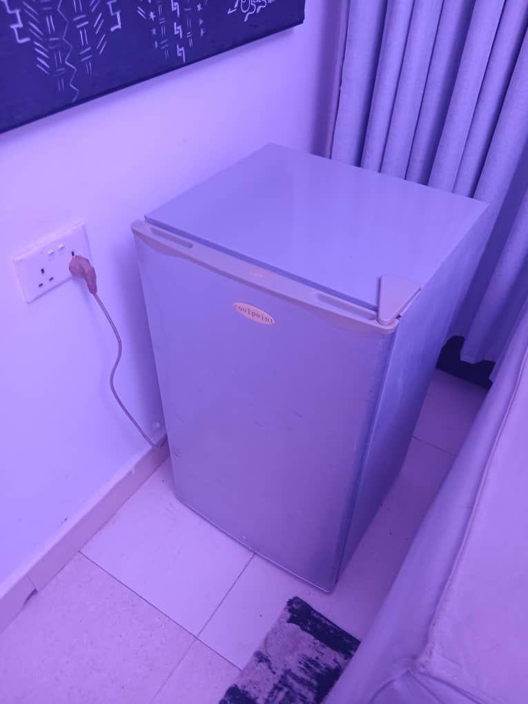 A picture of So clean and neat table top fridge