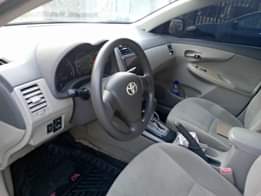 A picture of Toyota Corrola 2011 model in pristine condition with everything working