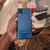 A picture of samsung A12 0655695769 128gb ram 4 BEI 250 000 Finger