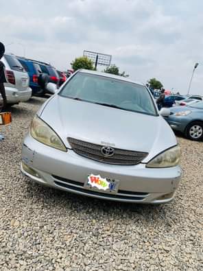 A picture of DISTRESS DISTRESS 2004 model of Camry big for nothing with