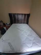 A picture of Nature foam Mattress and Double head board Hisence fridge Microwave