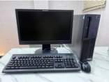 A picture of Desktop machines and monitor