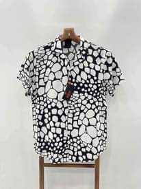 A picture of Vintage shirts available Call whatsapp 0757010109 Ugx 40000 Inbox for