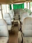 A picture of Naija used Toyota Coaster Bus buy and fix the AC