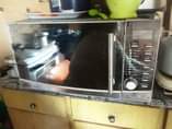 A picture of We fix broken electronic devices Tvs microwave plasma washing machine