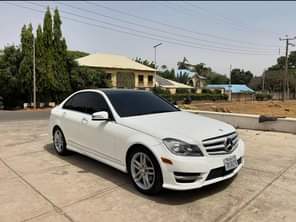 A picture of SLIGHTLY USED MERCEDES BENZ C300 2012 MODEL WITH OCD AT