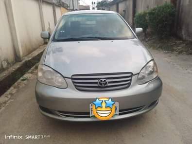 A picture of DEALER S Market Toyota Corolla 2004 Engine has little top