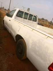 A picture of Toyota Hilux untouched chassis is available with good condition engine