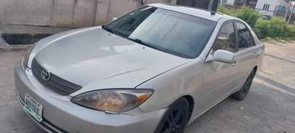 A picture of Toks standard Toyota Camry with an ANDROID SCREEN Few years