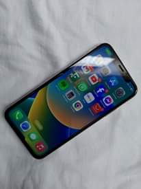 A picture of Apple iPhone X 64GB 390 000 0717992571 Kilimahewa Stand Mwanza.